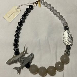 Brand new “shark” necklace.